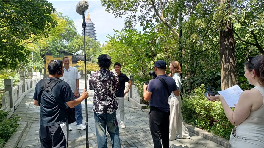 Documentary interview crew working in a Beijing outdoor location