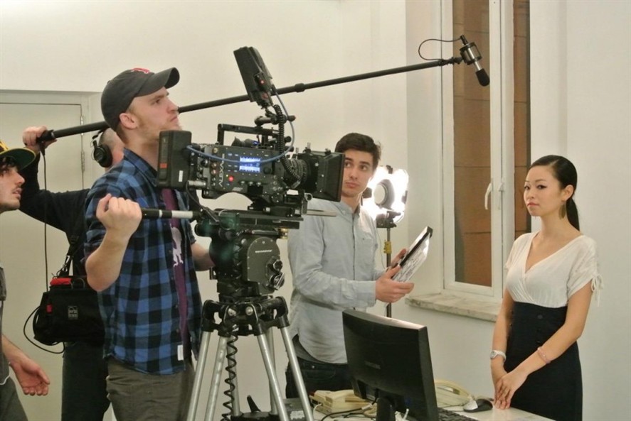 Interview production set in Beijing with monitoring and audio support