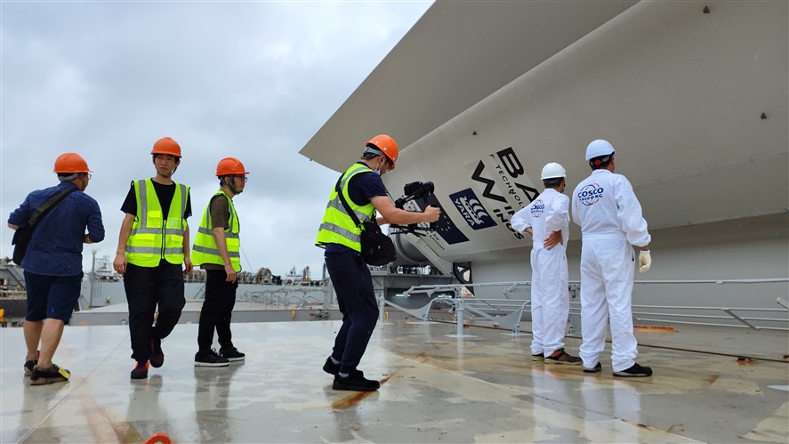Production crew working in an industrial environment near Beijing