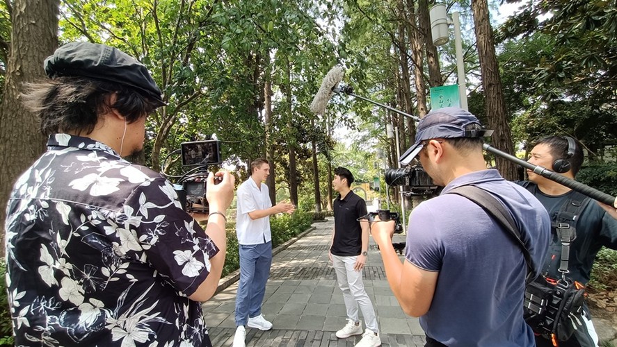 Location sound mixer supporting an outdoor interview shoot in Beijing